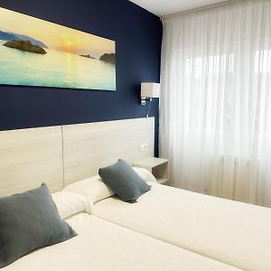 Habitación Estándar con 2 Camas Individuales